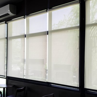 Blind on glass window, Transparent mirror window frame with curtain to protect sun light, Flare light through the window in the morning